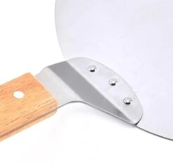 Luxe Pizzaschep Voor Verse Pizza - Extra Groot - RVS 30CM - Grote Pizza Schep Voor Oven Of BBQ Barbecue - Hout Handvat - Pizzaspatel Voor Zelfgemaakte Ovenpizza 9 Luxe Pizzaschep Voor Verse Pizza - Extra Groot - RVS 30CM - Grote Pizza Schep Voor Oven Of BBQ Barbecue - Hout Handvat - Pizzaspatel Voor Zelfgemaakte Ovenpizza -Barbecues Verkoopwinkel 1200x1148 2